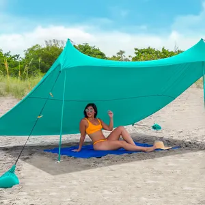 गर्मियों में आउटडोर हल्के समुद्र तट तम्बू सूरज शरण छाया कस्टम प्रिंट रेत 4 एल्यूमीनियम पोल के साथ समर्थन पॉप अप समुद्र तट तम्बू लंगर