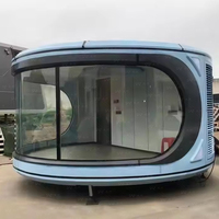 Maison de conteneur préfabriquée de forme ronde Circulaire multifonctionnelle moderne avec verre trempé pour les maisons préfabriquées Space Capsule