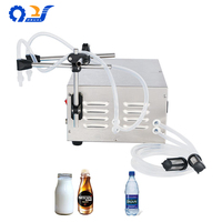 Machine de remplissage de liquides semi-automatique GFK-280-2 avec construction en acier inoxydable pour l'embouteillage de boissons et de jus à petite échelle