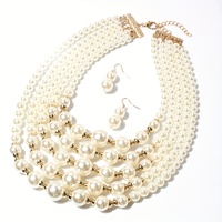 Ensemble de bijoux tendance bohème : collier ras-du-cou multi-rangs de perles et boucles d'oreilles assorties