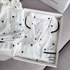 Ensemble de pyjamas boutonnés en satin de soie à imprimé floral pour femmes vêtements de nuit à taille élastique avec poche vêtements de nuit confortables