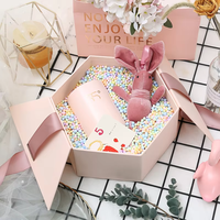 Boîte à rouge à lèvres et parfum rigide en papier recyclable personnalisée directement de l'usine, emballage cadeau créatif avec nœud et fleur, revêtement UV durable