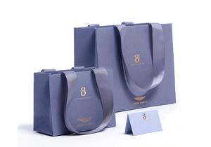 ถุงกระดาษช้อปปิ้งสำหรับร้านเสื้อผ้าหรูหราแบบสั่งทำพิเศษ พร้อมโลโก้ของคุณเอง สำหรับบรรจุภัณฑ์ขายปลีกและขายส่ง - Product Image 5