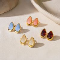 Boucles d'oreilles ovales élégantes et simples avec un design rétro et sophistiqué en résine en forme de goutte d'eau.