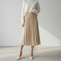 Vente en gros d'usine, jupe mi-longue plissée en jacquard décontractée et respirante pour femmes, été, plissée en trois dimensions