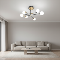 Lampe suspendue LED en fer de style nordique contemporain post-moderne de luxe, type « Magic Bean », pour chambre principale et salon, lumière chaude
