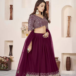 Lehenga moderne fluide couleur bordeaux en georgette douce, orné d'une bordure en dentelle à sequins argentés, ajoute une touche d'élégance royale et de brillance. Prix de gros pour mariage. - Product Image 1