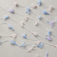 Tuyi Polyester Knitted and Woven Standard Uniformity Hand Knitting Space Dyed Fishtail Fancy Knot Yarn Nm 2.2