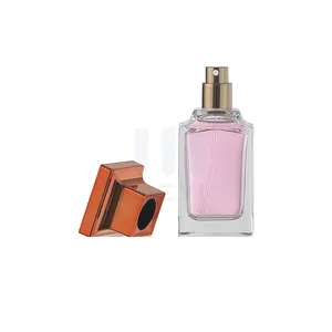 Nuevo diseño, venta al por mayor, frascos de perfume rectangulares de 60 ml personalizados con tapa roja, productor OEM, embalaje de botella de vidrio de perfume engarzado