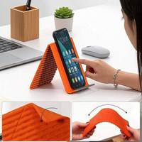 Support en silicone pliable et flexible pour téléphone, tablette et ordinateur portable Z52 – Support universel portable créatif et transformable pour utilisation mains libres