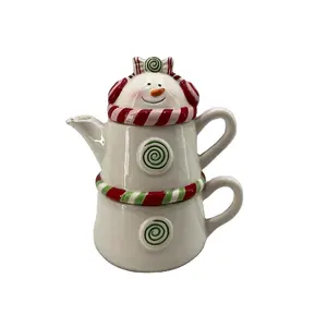 Funky snowman shaped ceramic kettle with mug set