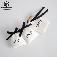 Sac de rangement en microfibre avec cordon de serrage pour bijoux, logo personnalisé, sac en velours de luxe pour bijoux, sac d'emballage pour bijoux avec nœud papillon