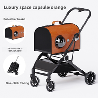 2026 Nouveau modèle de chariot de transport pour chat et chien, confortable, détachable, pliable à une main, 4 roues, coupe-vent, grande capacité, design capsule
