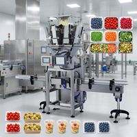 Multifunctionele multihead weegschaal voor het verpakken van fruit in punnetdozen, inclusief machine voor het vullen van cherrytomaatjes en clamshell verpakkingen.