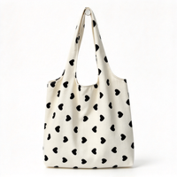 Sac fourre-tout en toile blanche avec imprimé cœur noir, sac à main décontracté à porter à l'épaule pour femmes, pour le shopping, les voyages et l'usage quotidien