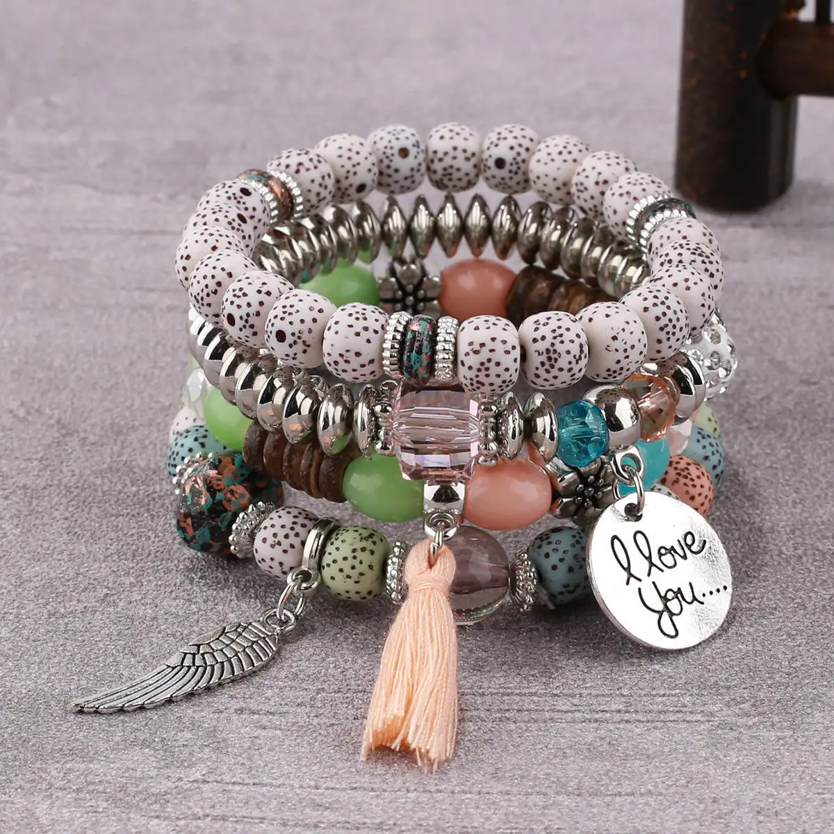 Vente en gros de bracelets Boho multicouches avec pompons pour femmes, filles, ailes de style ethnique, bracelets en perles de couleurs assorties