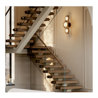 Escalier à monopoutre avec marches en bois composite à bord arrondi et cadre en aluminium thermolaqué