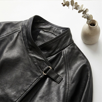 Veste en cuir de mouton noir vintage pour femme, col montant, patte de boutonnage asymétrique, veste courte en véritable peau de mouton avec poches