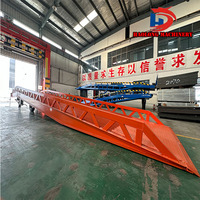 Rampe d'entrepôt rampe de camion pour le chargement de camions plate-forme en acier portable quai de chargement rampe élévatrice de voiture fabriquée en Chine