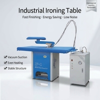 Robot de repassage automatique de vêtements pour table à repasser industrielle, conçu sur mesure pour le linge commercial, avec rideaux de protection