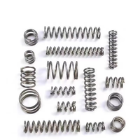 Production OEM à grande échelle de ressorts de compression pour amortisseurs à ressort hélicoïdal. Acier à ressort durable, avec une capacité de charge de 50 livres.
