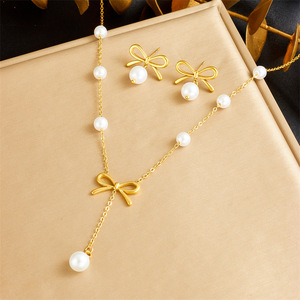 Parure de bijoux 2 pièces élégante avec nœud et perles, collier pendentif en acier inoxydable et boucles d'oreilles clous nœud, pour femme, idéale pour mariage - Product Image 5