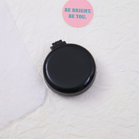 Miroir cosmétique rond pliable en plastique à double face éclairé avec couleur et logo personnalisés