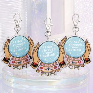Porte-clés humoristique pour la vente en gros : « Je vois traverser votre connerie » avec breloque boule de cristal, en vrac - Product Image 4