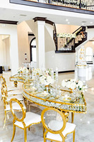Table à manger brillante de banquet de mariage de forme du cristal S d'acier inoxydable avec le dessus en verre pour l'hôtel d'étoile
