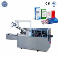 Insérateur automatique de dépliants pour machine d'emballage en carton de tubes et flacons de crème cosmétique