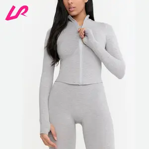 Venta al por mayor mujeres Activewear Thumbhole Yoga chaquetas Nylon suave acanalado Tops sin costuras Slim Fit Zip Up manga larga Fitness chaqueta