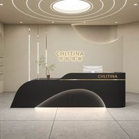 Bureau d'accueil moderne de luxe pour immeuble de bureaux et salon de beauté, design en forme de I en pierre artificielle sur mesure
