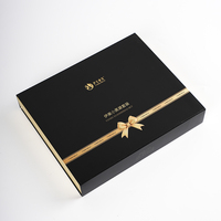 Ensemble d'emballage personnalisé pour soins de la peau, boîte en papier noire et dorée avec insert en mousse