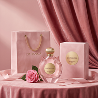 Nouveau modèle de flacon de parfum en verre 30ml 50ml 100ml Flacon de parfum rose de luxe avec boîte d'emballage et couvercle doré