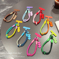 Cordon de téléphone tressé color block court anti-perte avec pendentif cœur, breloque de téléphone personnalisée très tendance