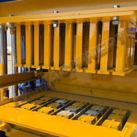 Máquina de molde de ladrillo de cemento totalmente automática de 220V, bloque hueco, componentes de núcleo de procesamiento de vibración para fabricación de hormigón