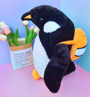 Peluche pingouin mignon avec nœud fraise, jouet en peluche pour machine à griffes, vente en gros, OEM, personnalisable