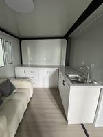 Maison conteneur mobile pliable, isolée, extensible, moderne et de luxe, préfabriquée, avec cuisine, salon, chambre et bureau à domicile