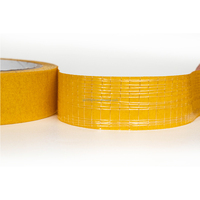 Ruban adhésif double face en maille avec adhésif thermofusible pour usage domestique