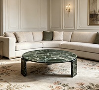 Table basse ronde en marbre vert de luxe, design moderne et minimaliste pour salon de villa ou d'hôtel