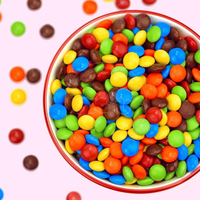 Usine chinoise en forme de cercle de haricots au chocolat au lait chaud personnalisé coloré avec le meilleur type d'emballage de chocolat sucré du grossiste