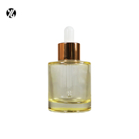 Botol Tetes Kaca Berbentuk Bulat 30ml 50ml Gradasi Kuning dengan Dasar Tebal untuk Serum Kosmetik dengan Tutup Emas.
