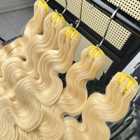 Yiwigs Usine En Gros Prix 10A 12A Remy Brésilienne Vierge Extensions De Cheveux Humains Et Corps Vague 613 Faisceaux de Cheveux Blonds