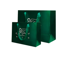 Sac en papier de luxe noir pour boutique de soie, nouveau design, avec logo personnalisé, pour emballage cadeau