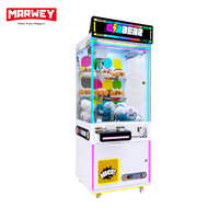 Machine à grue commerciale avec vitrine en verre trempé, enseigne LED personnalisable, marque MARWEY, à monnayeur pour parcs d'attractions