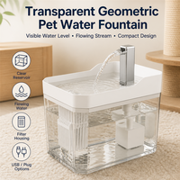 Réservoir transparent à corps géométrique permet aux propriétaires de vérifier le niveau d'eau et de stimuler le boisson des chats quotidiennement. Fontaine à eau pour animaux de compagnie.