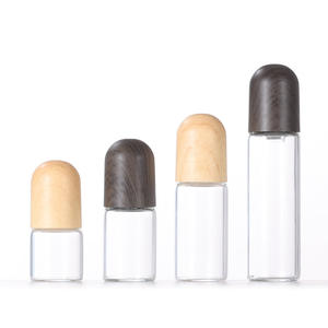 2024 Offre Spéciale 1ml2ml3ml <span class=keywords><strong>Grain</strong></span> <span class=keywords><strong>de</strong></span> <span class=keywords><strong>bois</strong></span> couverture rouleau bouteille pack d'essai <span class=keywords><strong>parfum</strong></span> huile essentielle petite sous-bouteille petite bouteille à rouleau - Product Image 1
