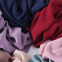 Tissu pour peignoirs de Dubaï en polyester tissé de couleur unie, crêpe de chine, tissu crêpe de mousse abaya pour vêtement doux pour femmes