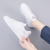 Vente en gros baskets blanches supportées OEM et ODM chaussures de skate basses à la mode pour femmes chaussures de campus pour filles