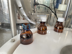 Industria de maquinaria de alta velocidad Botella pequeña Líquido oral Jarabe Vial Máquina de llenado Líquido 10-100ml - Product Image 5